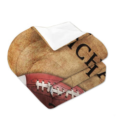 Overhead view of khaki sand footballer bedding arranged neatly across an athletic youth bedroom mattress