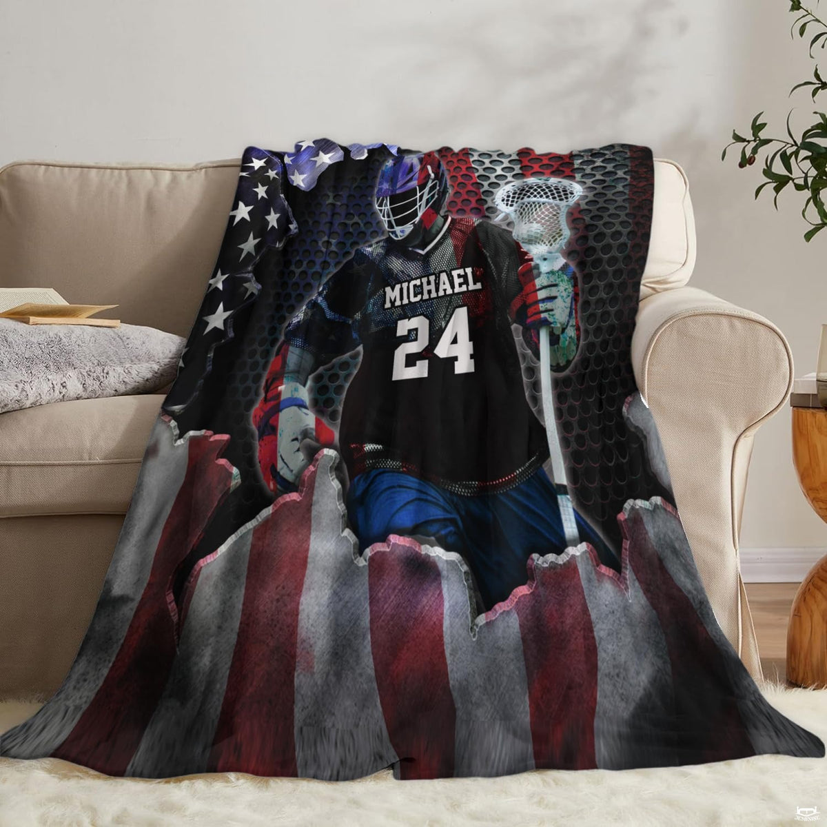 Two models holding open the patriotic lacrosse player sports blanket outdoors.