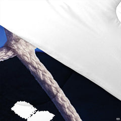 Folded presentation of ice hockey bedding displaying sharp graphic clarity in midnight navy and blue tones