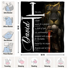 Detailed visual of knight in dark armor holding flaming sword on lion themed bedding thematic accent.
