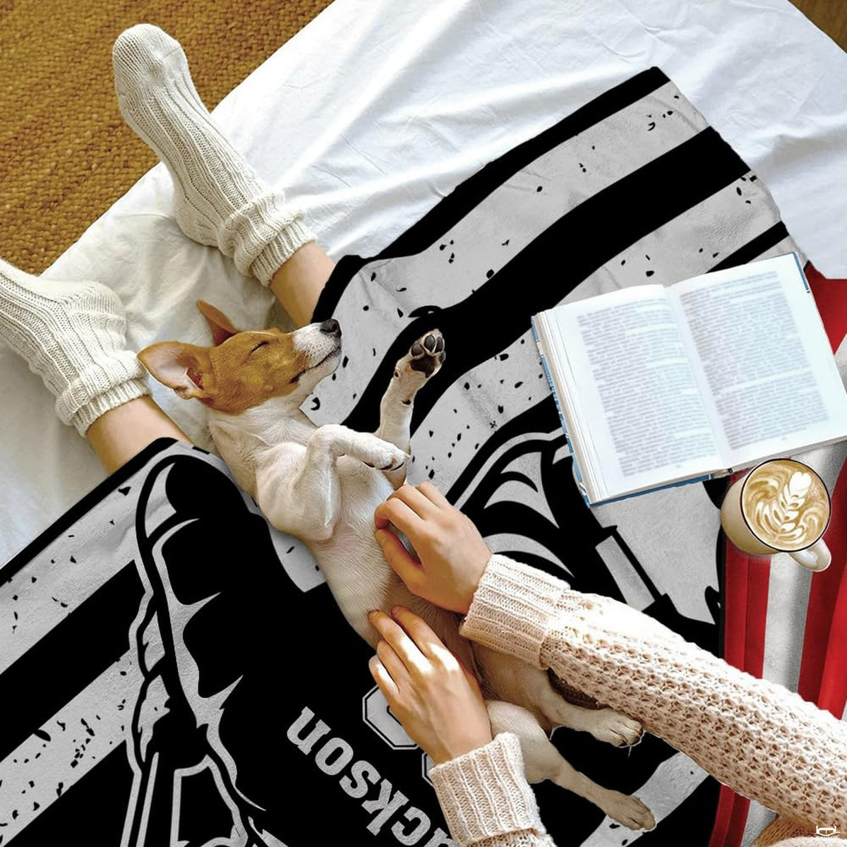 Side angle shot of graphic baseball bedding set highlighting vibrant red, white, and navy print.