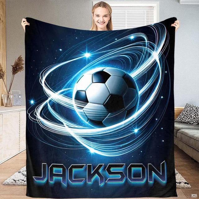 Soccer ball bedding set artwork glowing with neon blue cosmic swirls on dark navy.