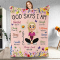Scripture affirmation floral throw blanket held up showcasing illustrated girl and colorful wildflower borders