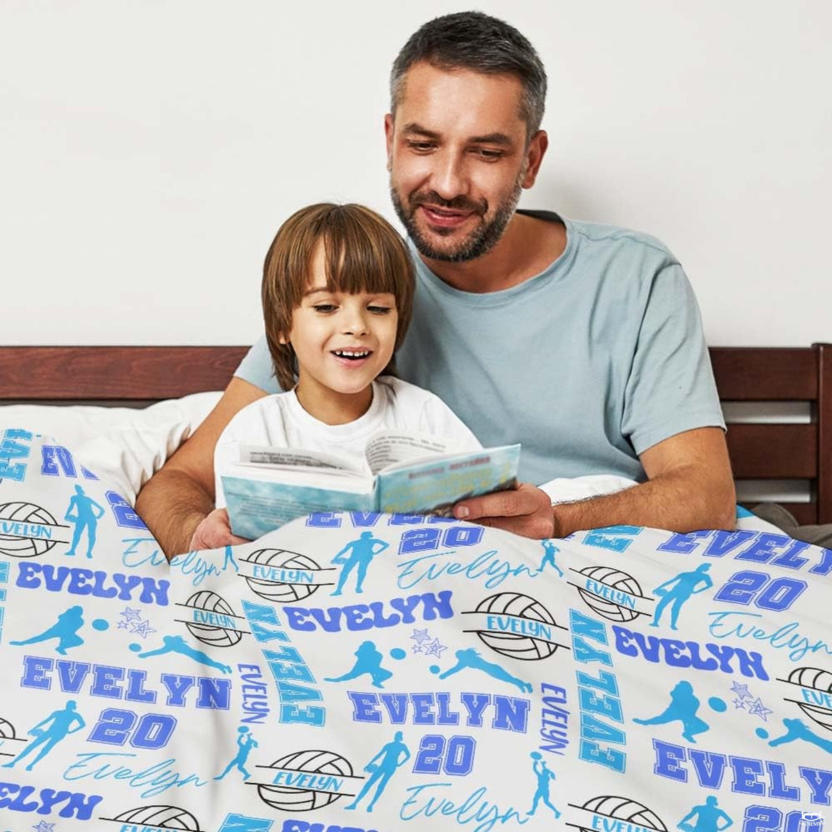 Bedroom decor perspective featuring blue and white athletic volleyball patterns.