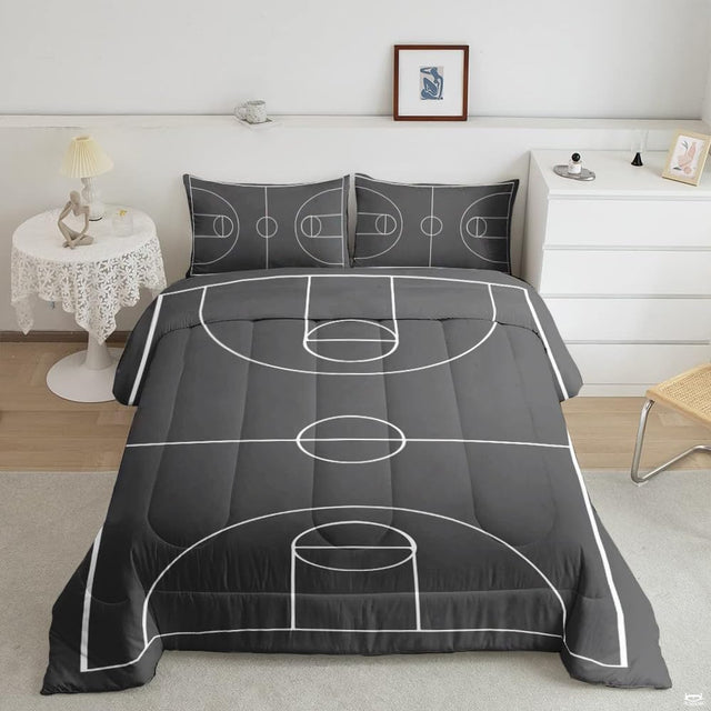 Monochrome soccer cleats and ball field bedding set displayed neatly on a bed in a sporty bedroom