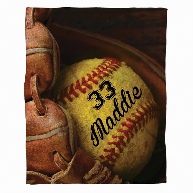 Front full perspective of softball glove throw blanket showing yellow ball resting inside brown mitt