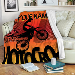 Motocross dirt bike throw blanket draped across living room couch