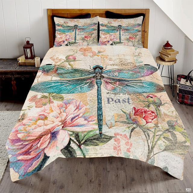 Teal dragonfly floral bedding in a bright bedroom