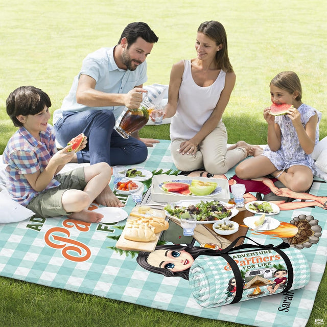 Cartoon couple by campfire and teardrop camper trailer on mint gingham, view 2.