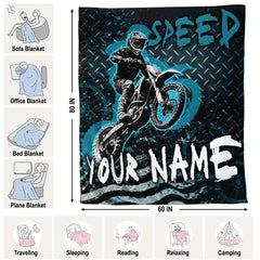 Bedroom display featuring extreme dirt bike motocross bedding set with cyan paint splatter highlights.