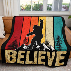 Rock on Bigfoot silhouette atop snowy mountain peaks with retro sunset stripes, view 3.