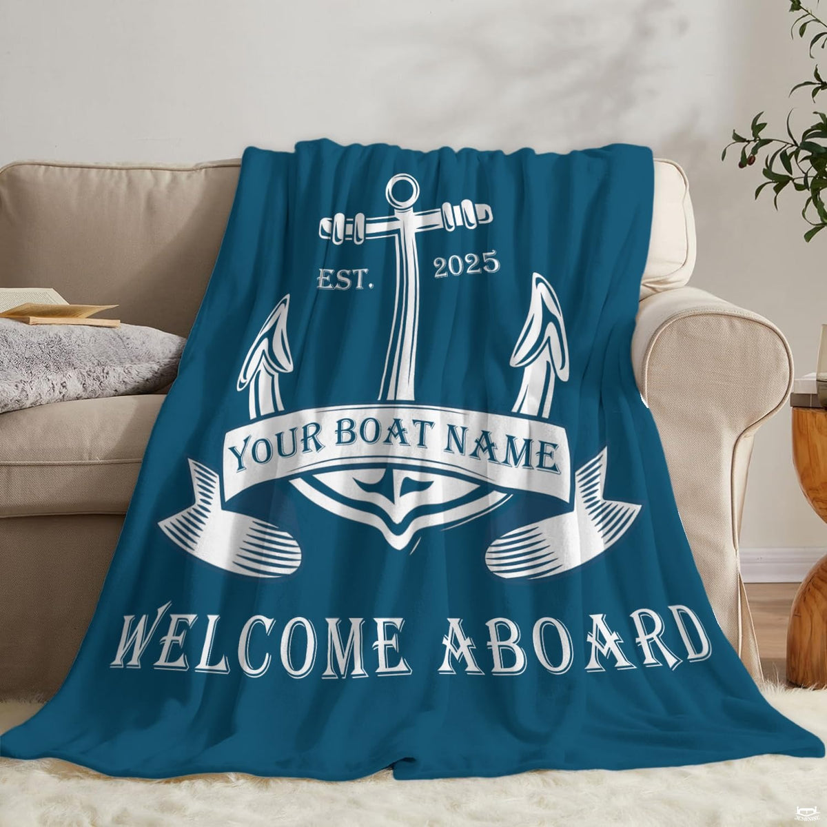 Side perspective showing crisp white graphics over rich navy on coastal blue bedding.