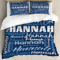 Blue typography bedding featuring an interlocking word collage of block and script lettering on navy backdrop