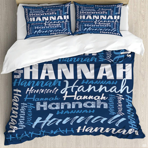 Blue typography bedding featuring an interlocking word collage of block and script lettering on navy backdrop