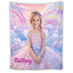 Fairytale princess photo blanket styled across a bed in a pastel girls bedroom.