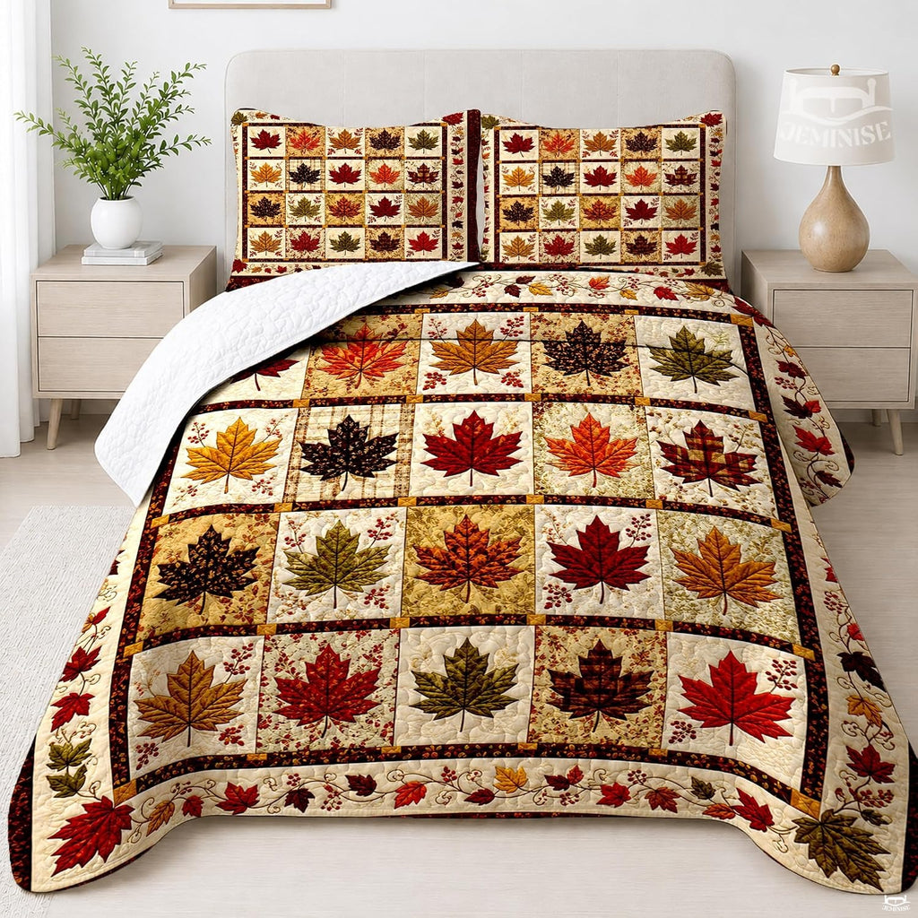 Autumn bedding set featuring a patchwork grid of colorful maple leaves and wild berry borders