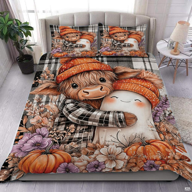 Overhead bedroom view displaying Highland cow hugging ghost bedding with matching pillowcases.