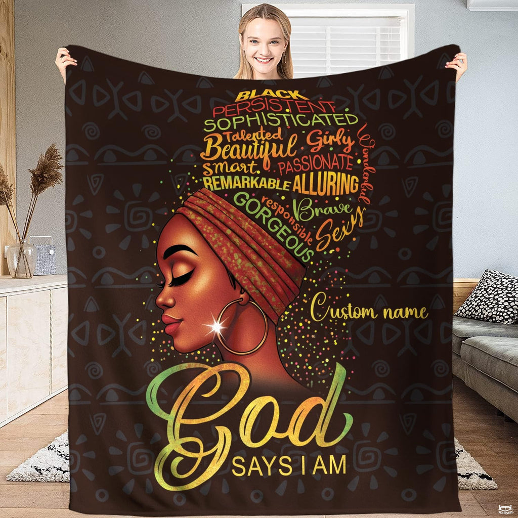 Afrocentric affirmation throw blanket featuring woman profile in headwrap with typographic afro silhouette