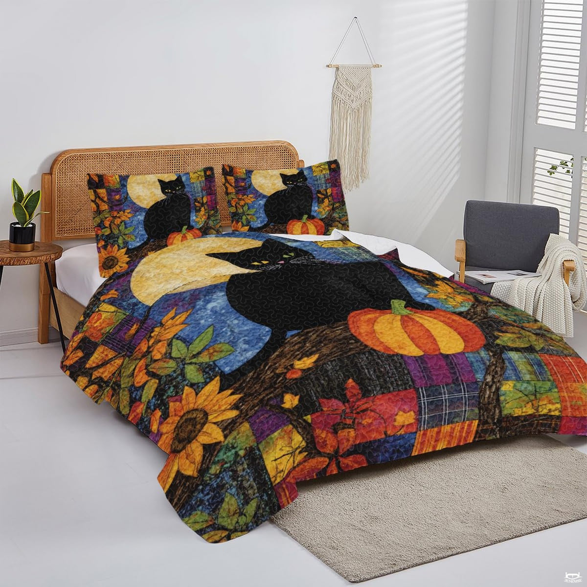 Overhead view of colorful autumn cat bedding spread across a contemporary master bedroom wooden bed