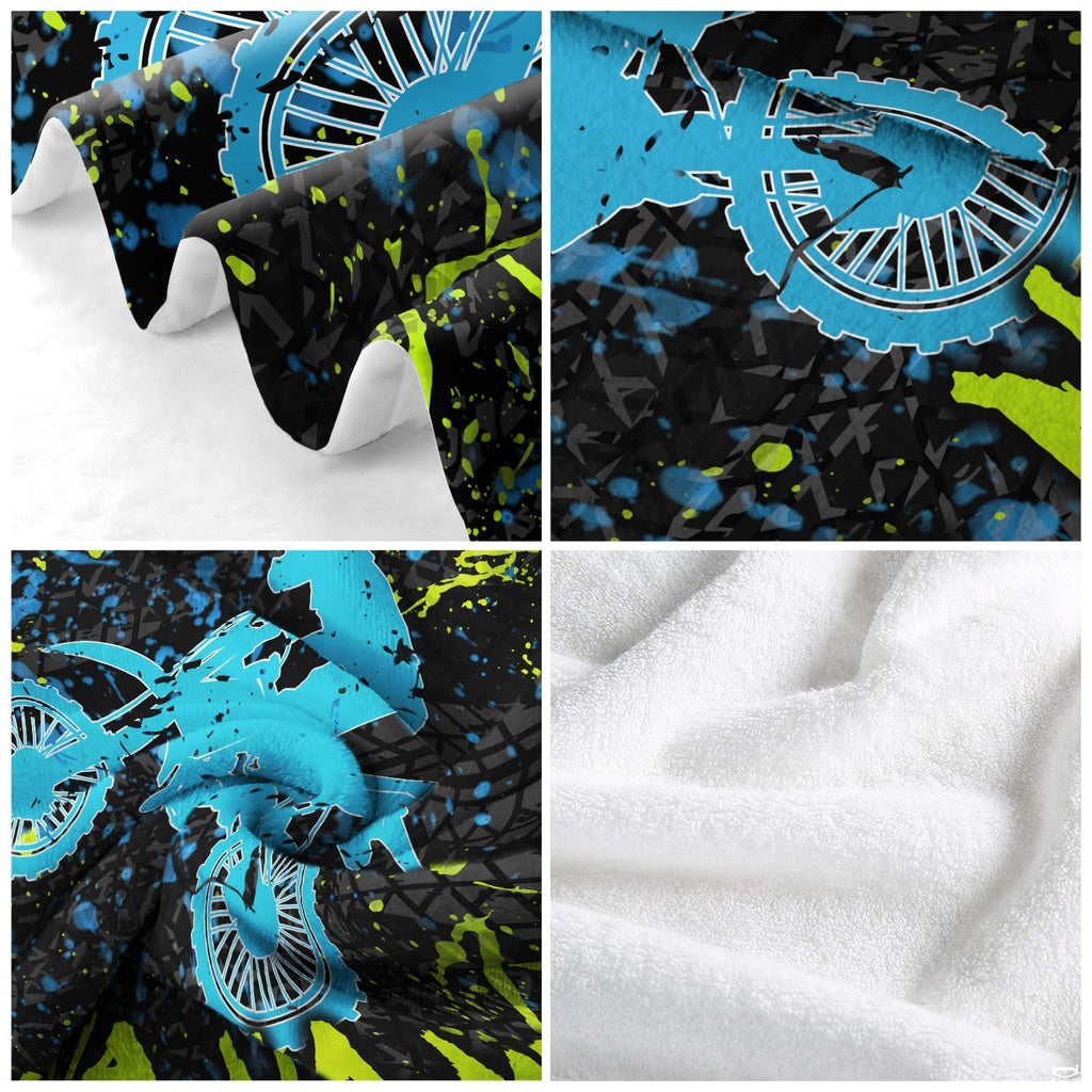 Airborne motocross dirt bike rider silhouette with neon splatters and tire tracks, view 5.