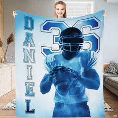 Football player graphic bedding set in gradient light blue and navy tones.