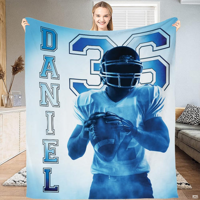 Football player graphic bedding set in gradient light blue and navy tones.