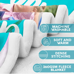 Folded graphic blanket highlighting maintenance icons, seam finishes, and fleece construction.