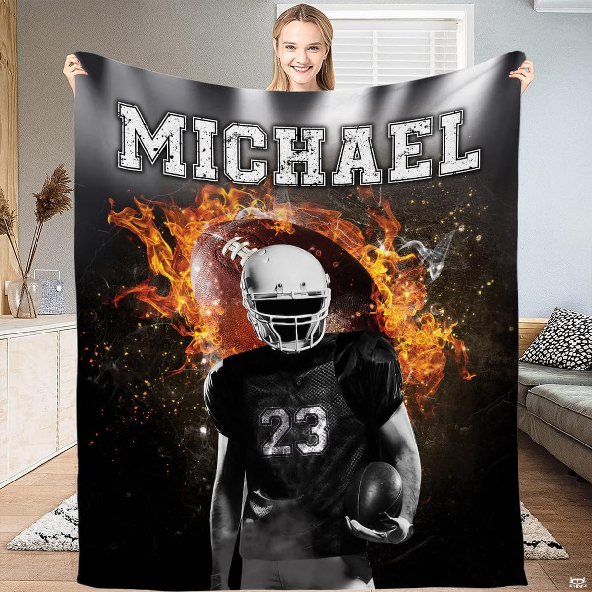 Flaming football player athlete throw blanket displaying burning pigskin ball and armored player