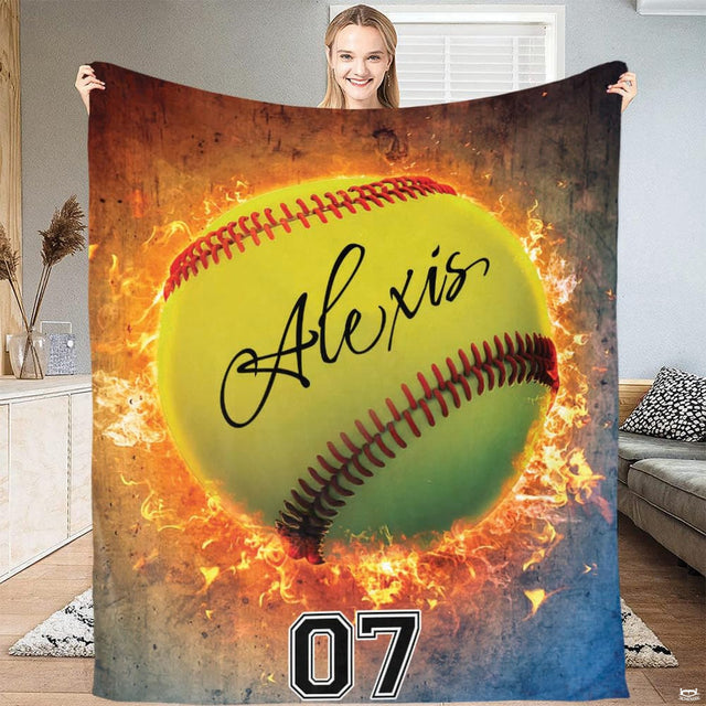 Close up macro view of flaming softball blanket highlighting fleece fibers and rich fire graphics