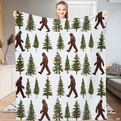 Pine forest bedding showing repeating walking Sasquatch silhouettes and evergreen trees on white.