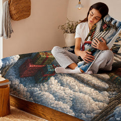 Winter landscape scene with snowy staircase and glowing Christmas tree print across decorative bedroom bedding.