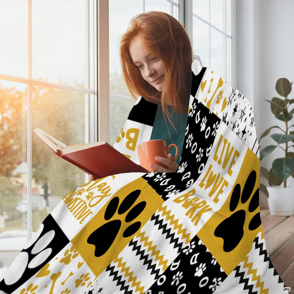 Golden dog paw print throw blanket view 5 highlighting patchwork pattern squares, bones, and stripes