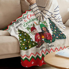 Holiday hearthside motif draped across indoor furniture in a modern living space.