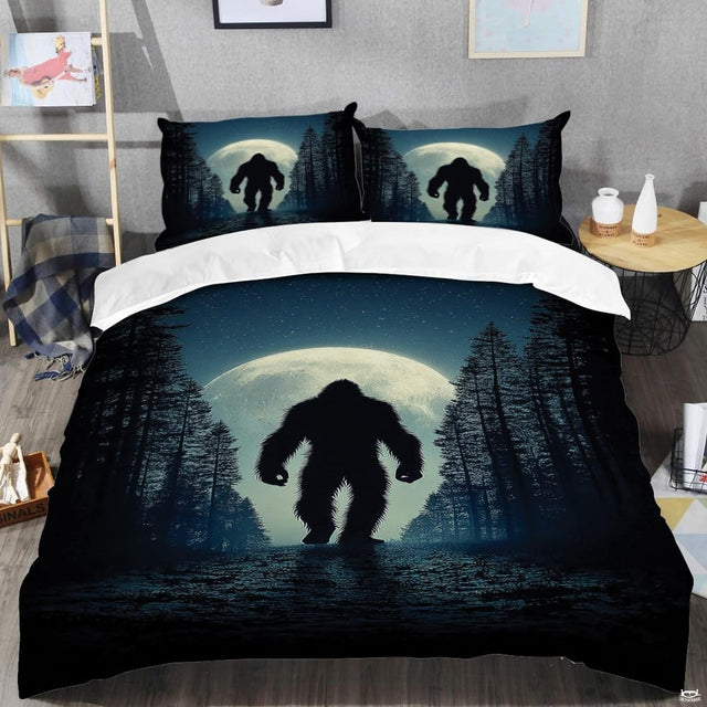 Top angle perspective of bigfoot silhouette bedding showing detailed striped lunar rings and pine tree accents.