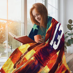 Young woman reading by sunny window wrapped in patriotic American flag football throw blanket
