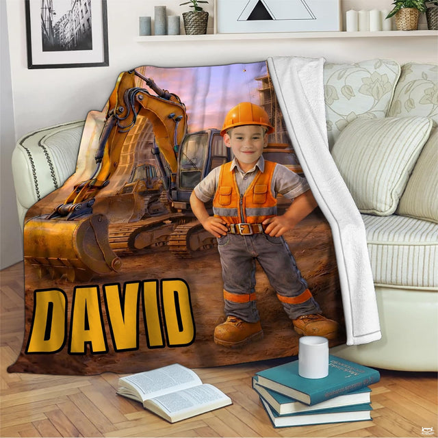 Little construction builder excavator throw blanket displayed on living room couch