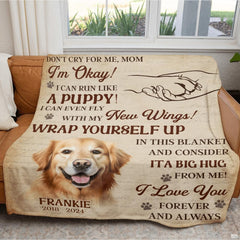 Golden retriever memorial throw blanket draped across a living room sofa