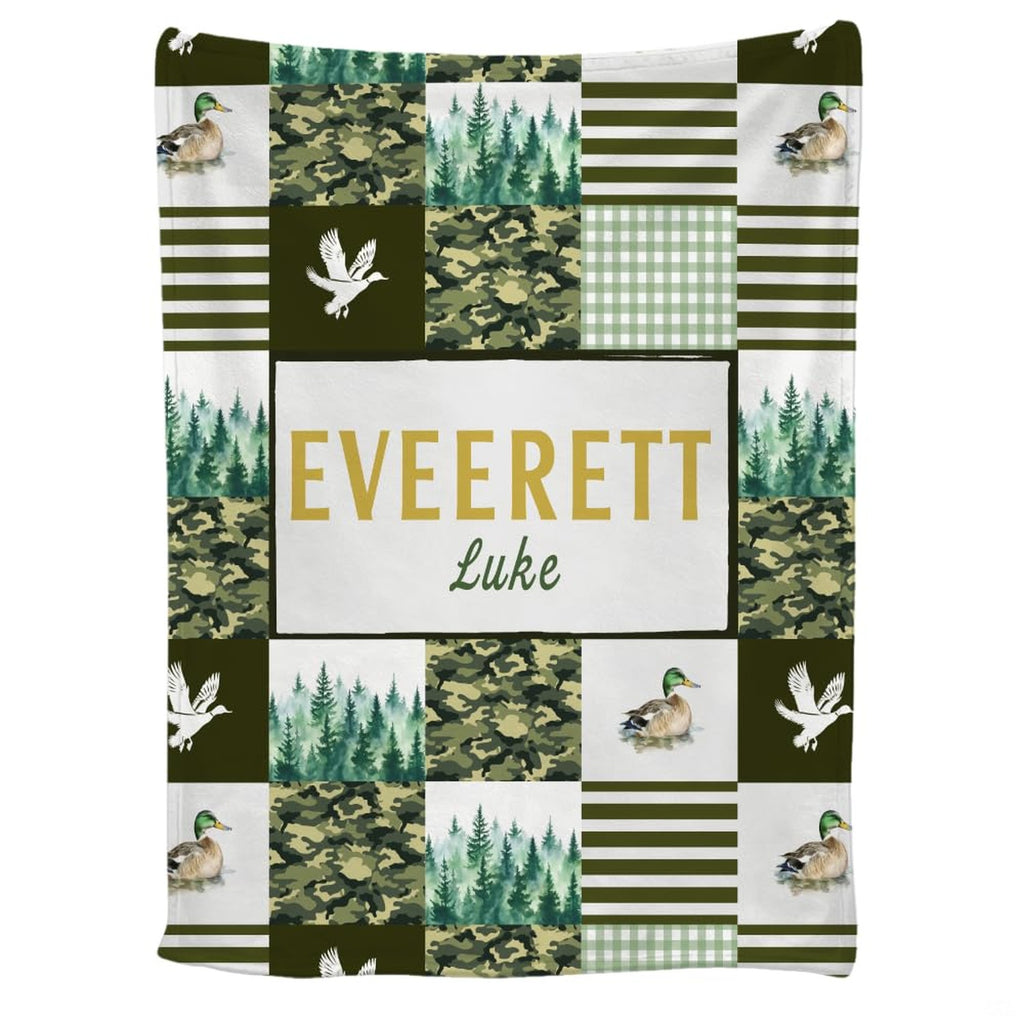 Mallard duck throw blanket featuring patchwork tiles of camouflage, pine trees, and waterfowl.