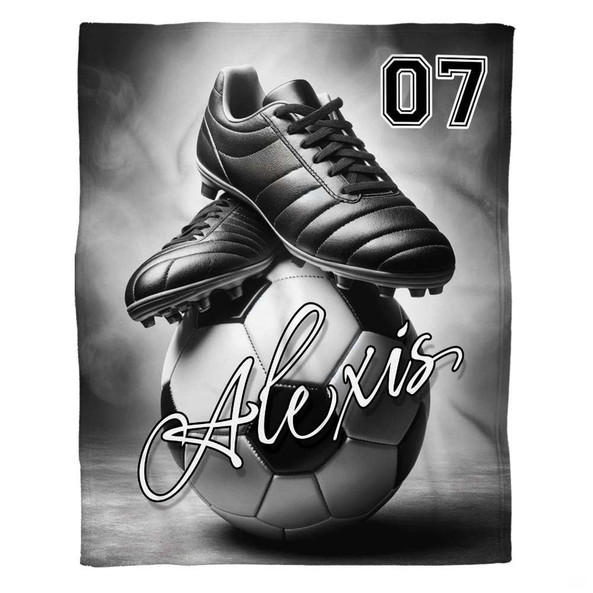 Monochrome soccer cleats atop a ball with bold jersey numerals and cursive script over a smoky backdrop.