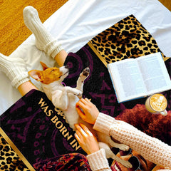 Bedroom view highlighting decorative portrait motif and bold leopard animal print border details.