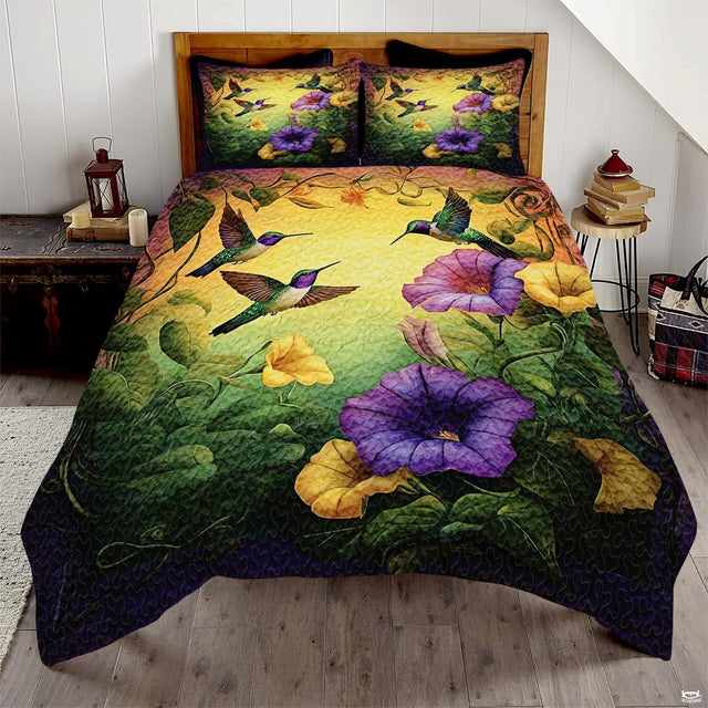 Purple floral hummingbird bedding in a bright bedroom