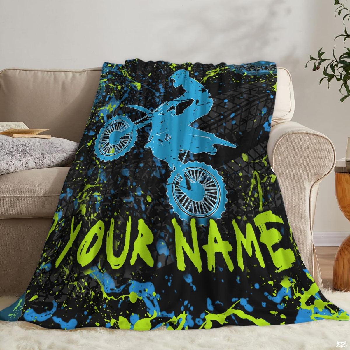 Airborne motocross dirt bike rider silhouette with neon splatters and tire tracks, view 6.