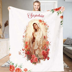 Serene watercolor painting of the Virgin Mary praying encircled by pink and coral roses on off-white backdrop.