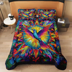 Overhead bed view with a hummingbird and colorful geometric mosaic