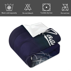 Angled perspective of midnight soccer bedding showing athletic white script typography