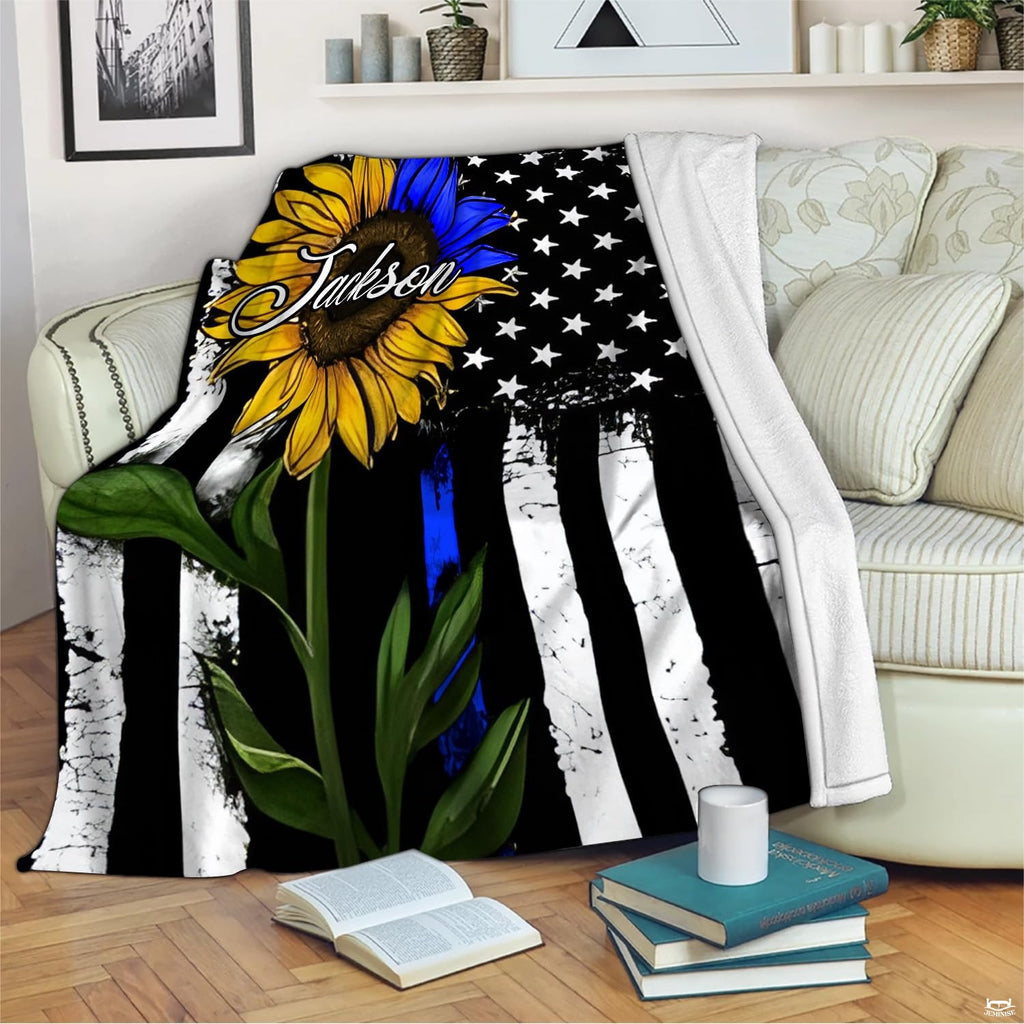 Sunflower police tribute flag graphic blanket draped across sofa