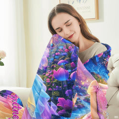 Detail view of neat hemmed edge and vibrant color printing on fairy princess blanket.