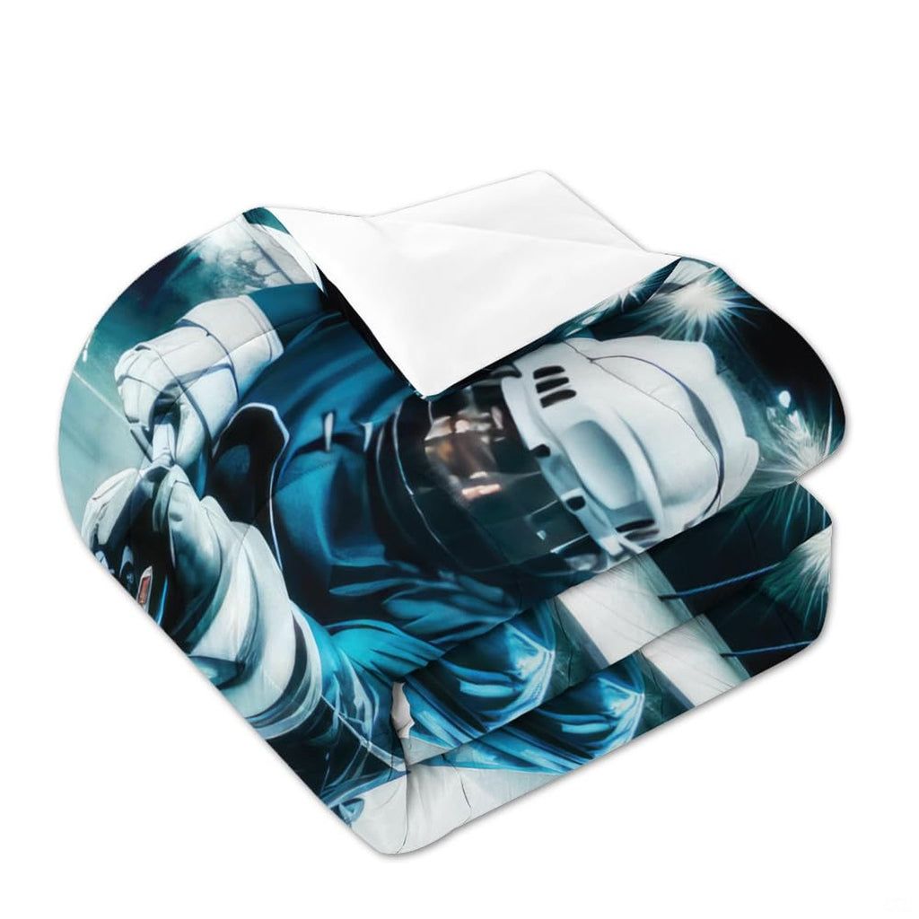 Matching pillowcase detail for hockey bedding set showing coordinating sticks, pucks, and goalie helmet art