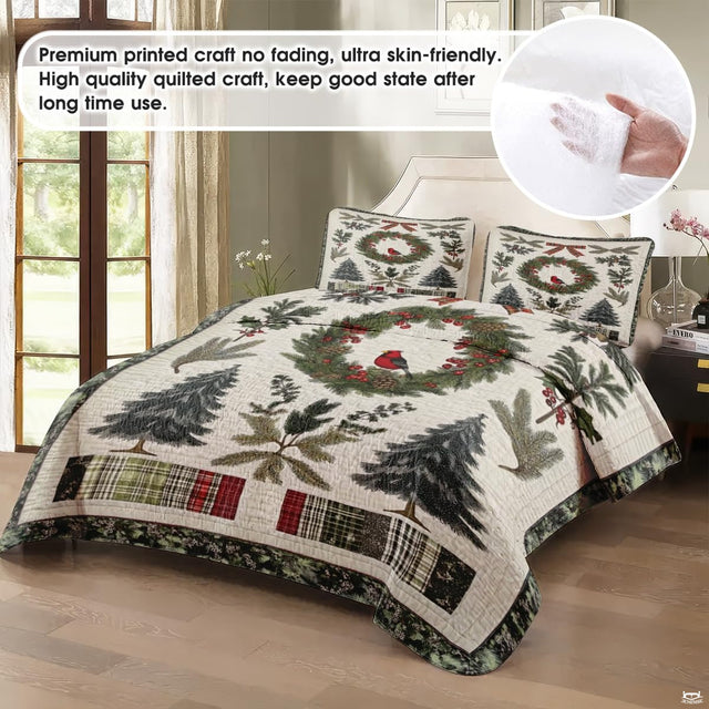 Close-up view of holiday bedding showcasing cranberry red accents, pine wreath, and snowman motifs