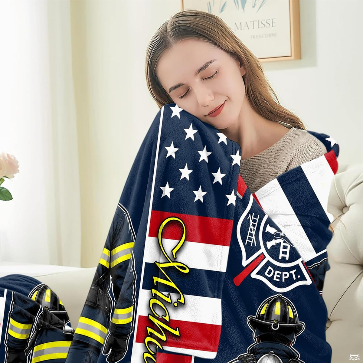 Draped presentation highlighting firefighter silhouette and heraldic badge on Blanket.